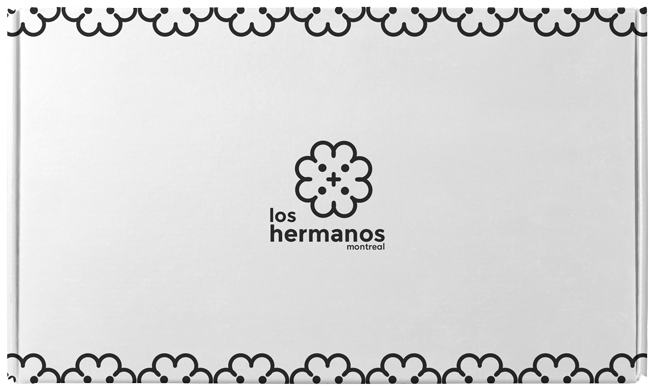 Black and white custom shipping box with Los Hermanos Branding